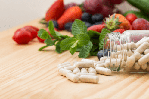 Dietary Supplement Capsules With Fruits and Vegetables